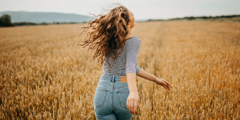 carefree women in natural field