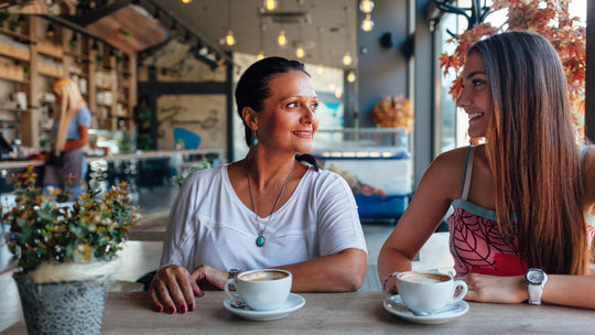 two menopausal women having coffee